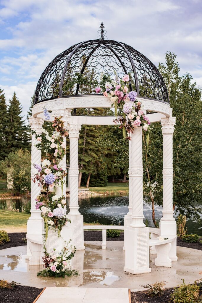 Outdoor gazebo covered in florals during spring