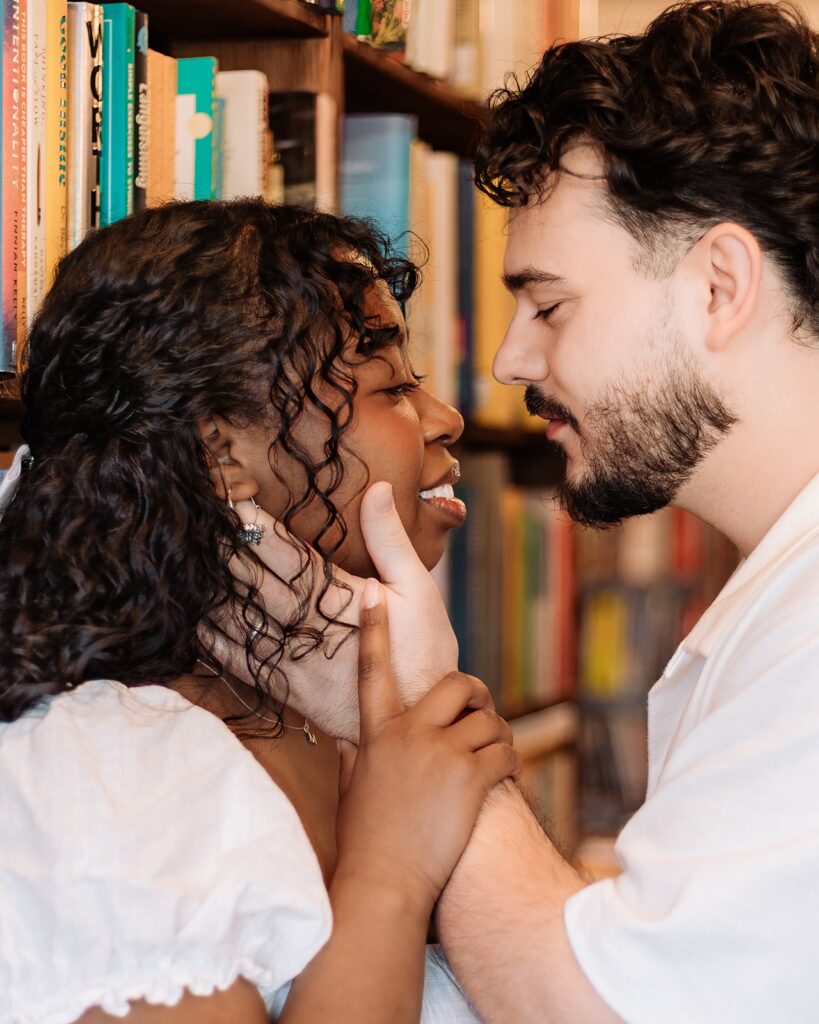 Couple cozying up at Pages on Kensingston
