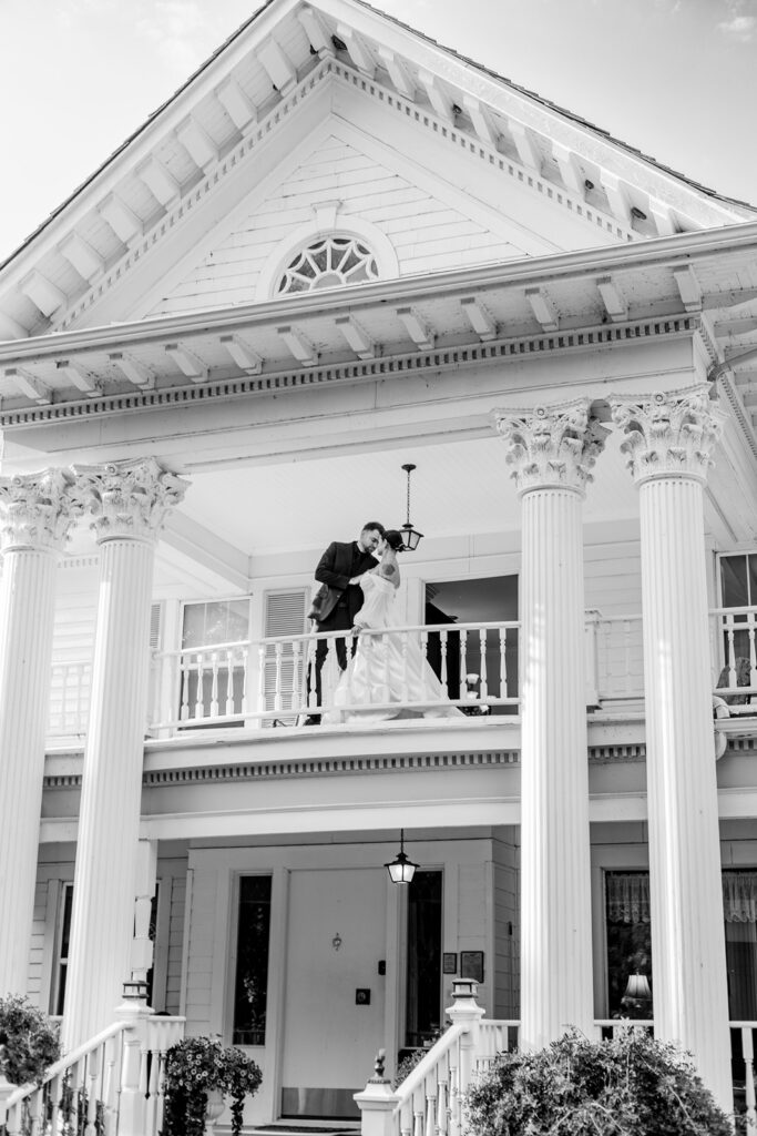 Bride and groom portrait on the top balcony of the Norland Historic Estate