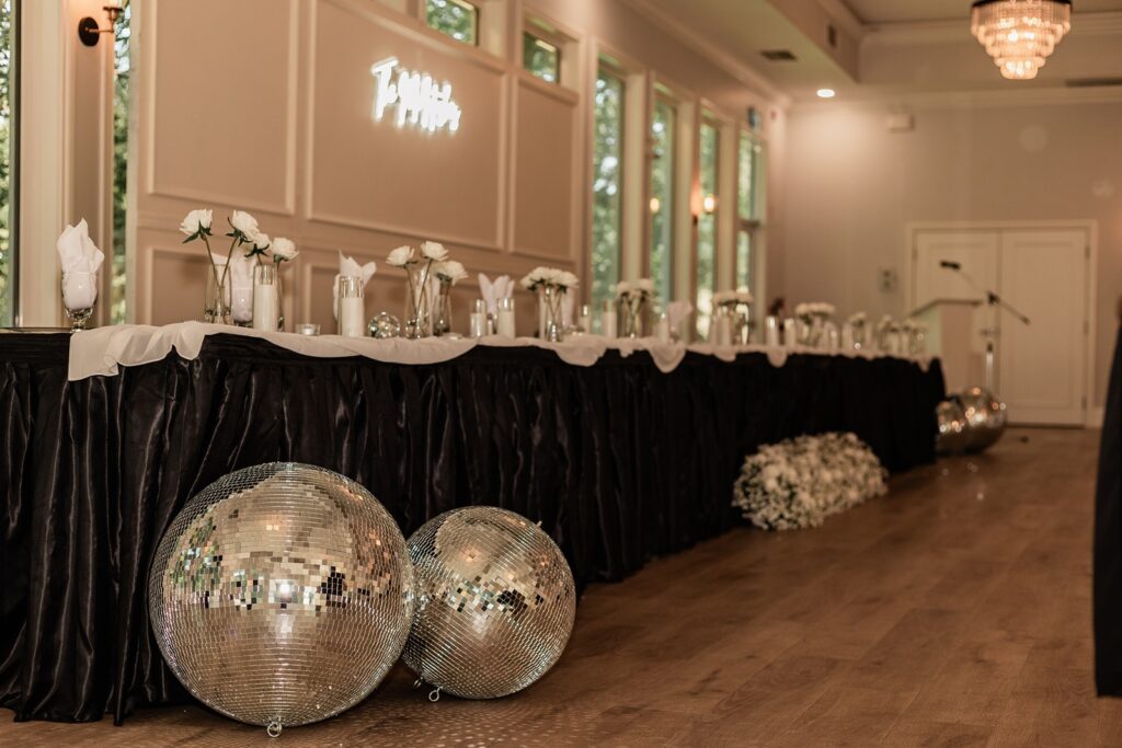 The Norland Estate head table during a wedding reception in the ballroom