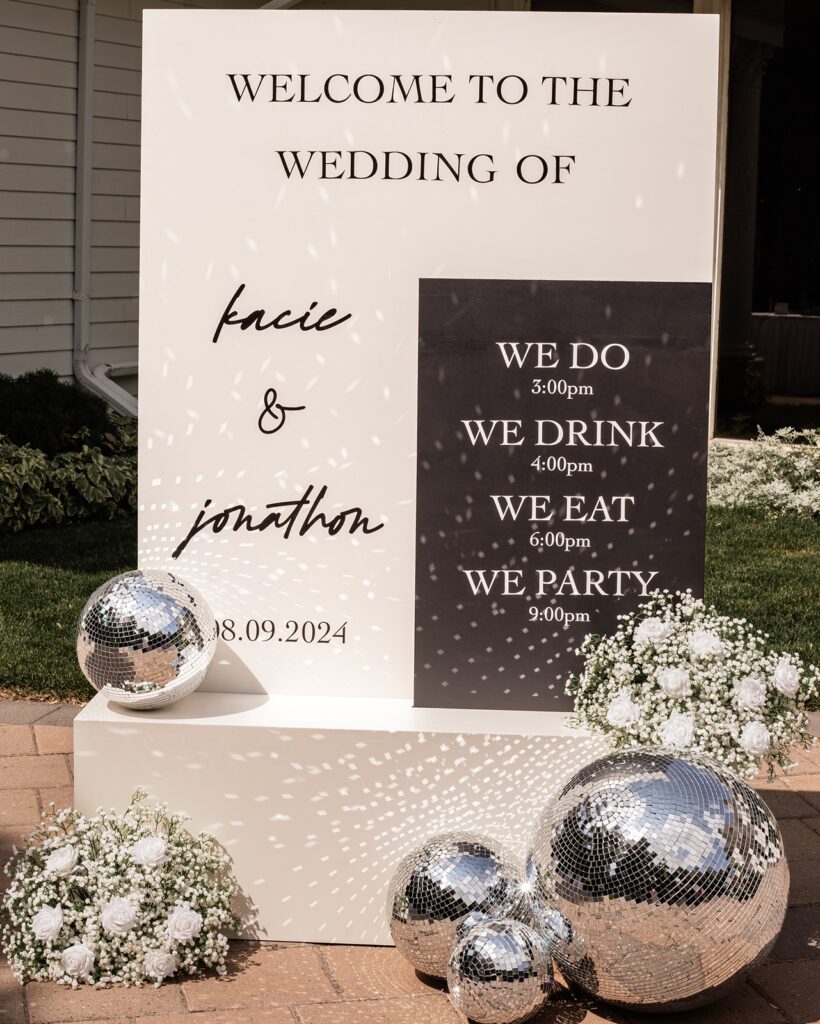 Welcome wedding sign with disco balls