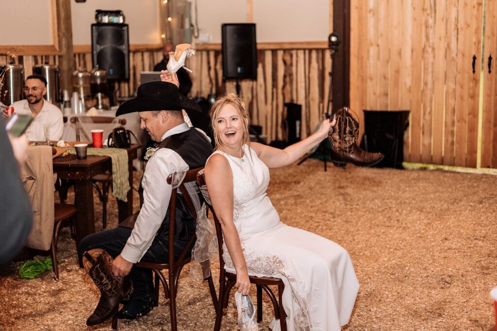 Bride laughing during the shoe game