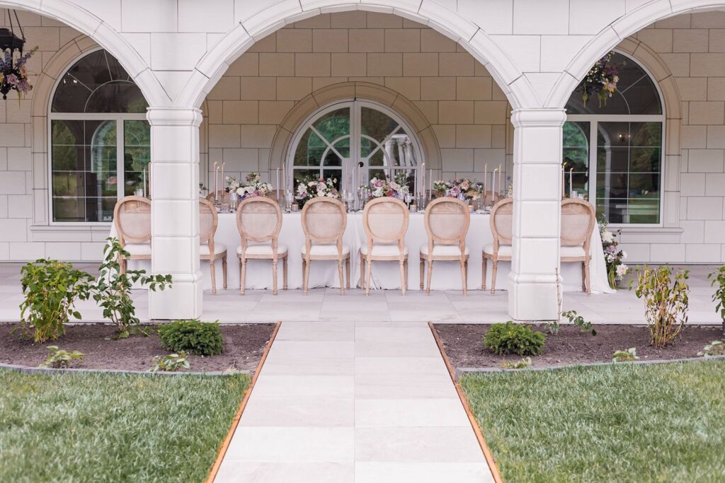 A pulled back look of a wedding reception table design