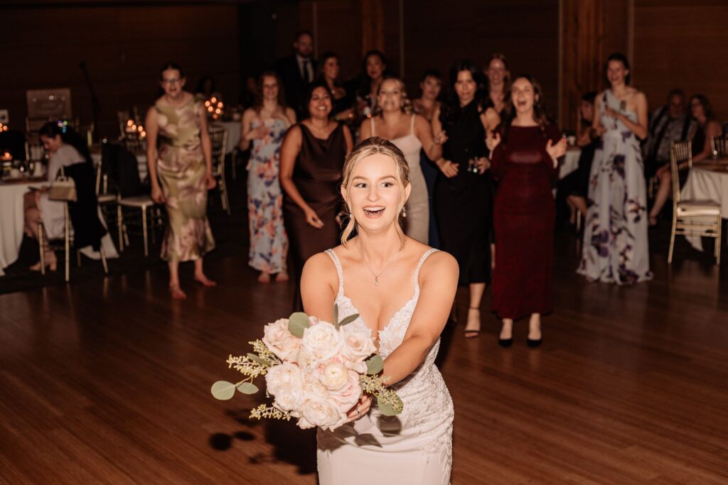 Bride getting ready for a bouquet toss